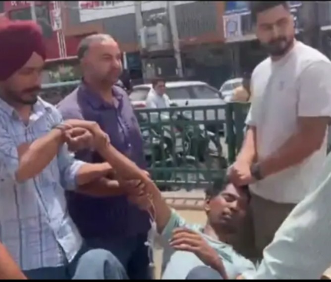 The drug addict who was tampering with the vehicles was beaten up by the people and taken to the hospital